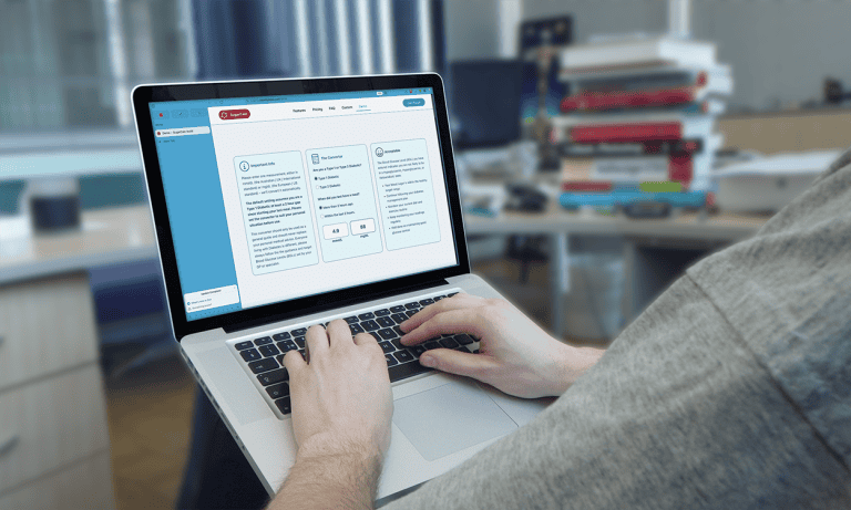 User accessing the SugarCalc converter on a laptop